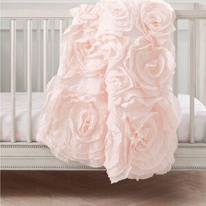 Monique Lhuillier Rosette Baby Quilt
Handcrafted
Pottery Barn